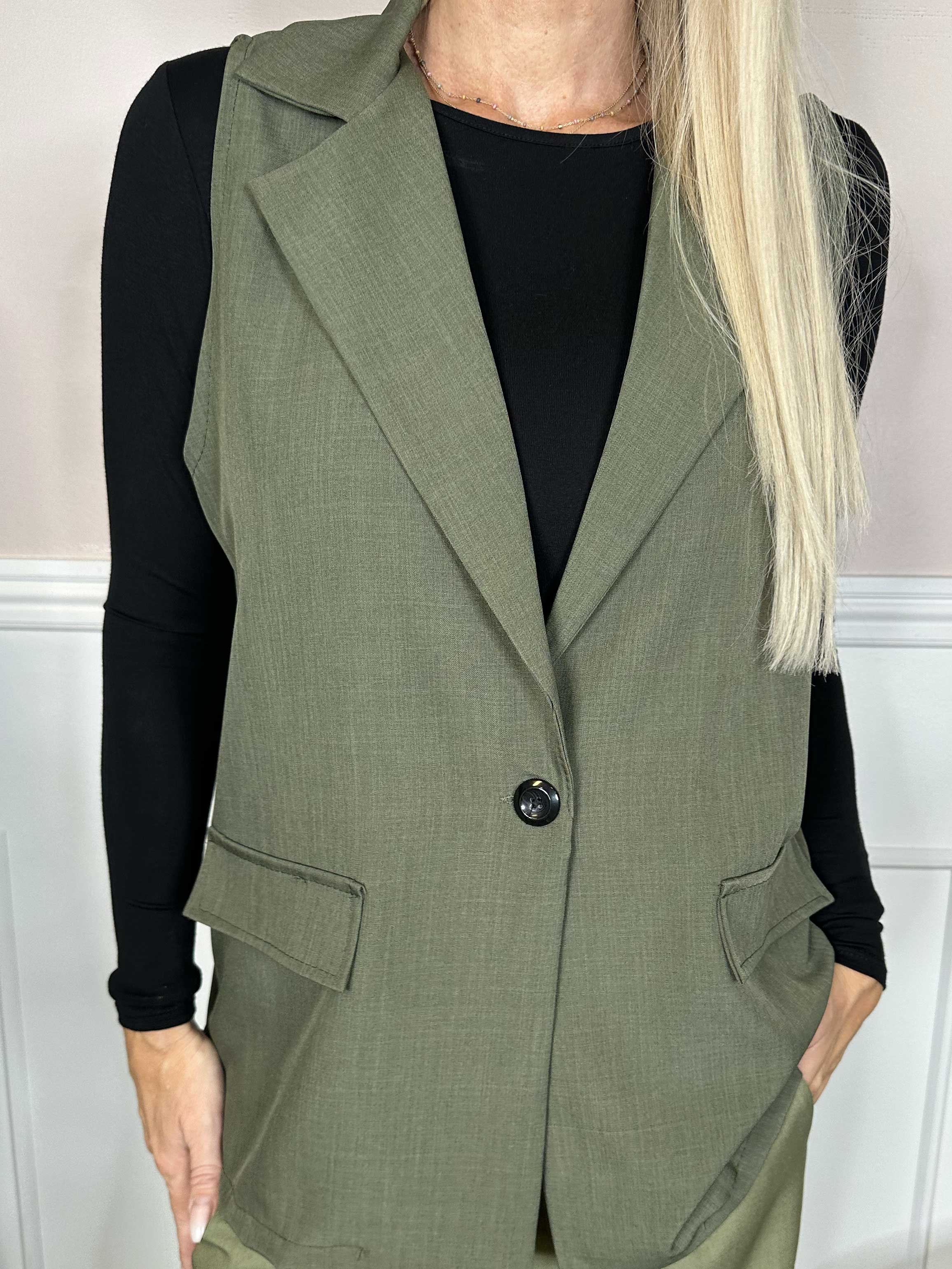 Shadia Vest - Enfärgad kostymväst med knapp och